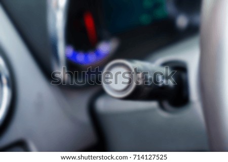 Turning handle in the car blurred abstract background