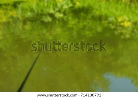 Fishing on a float fishing rod blurred abstract background