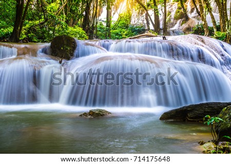 Pha Tat Waterfall,Forest stream waterfall with sunlight in khuean srinagarindra national park,Thailand.