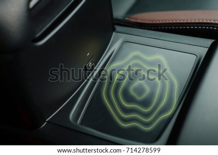 wireless mobile charger system in modern car.