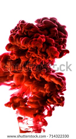 red ink in water isolated on white background