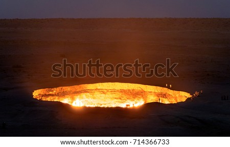 Turkmenistan gates of hell gas crater fire in Karakum desert near Darvaza. Burning methane gas crater in Derweze in Karakum desert. Door to hell in Turkmenistan.