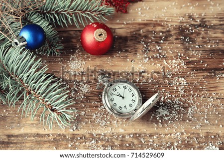 Watch and decorations on table. Christmas countdown concept