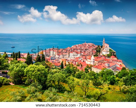 Aerial view of old town Piran. Splendid spring morning on Adriatic Sea. Beautiful cityscape of Slovenia, Europe. Traveling concept background. Magnificent Mediterranean landscape. Royalty-Free Stock Photo #714530443