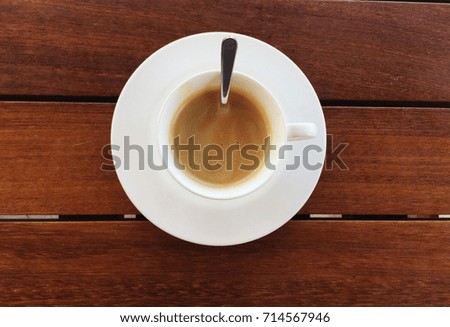 Coffee espresso breakfast coffee with spoon on the table closeup top view 