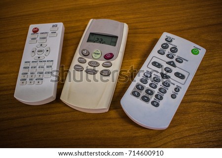 Projector remotes and air conditioner remote adjust to 23 degree celsius