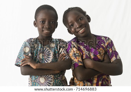 Two awesome African children posing with arms crossed, isolated 