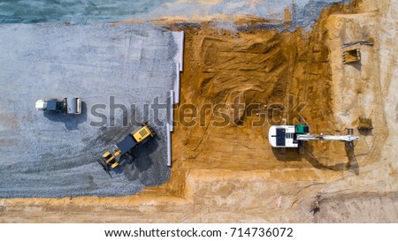 Aerial photo of an excavator and bulldozers working on a construction site in Treillieres, Loire Atlantique, France