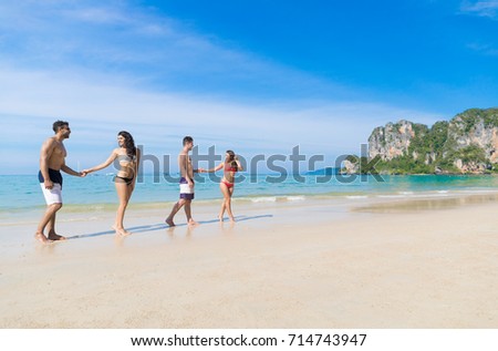 Two Couple On Beach Summer Vacation, Young People In Love Walking, Man Woman Holding Hands Sea Ocean Holiday Travel