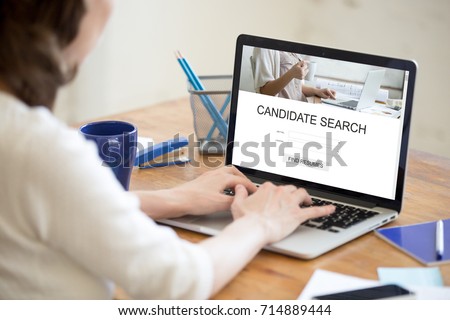 HR manager searching for new candidates online to fill open vacancy, recruiter working on laptop in recruitment agency, we are hiring, human resource management, job search app service, close up view Royalty-Free Stock Photo #714889444