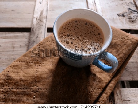 tea cup placed on wooden background