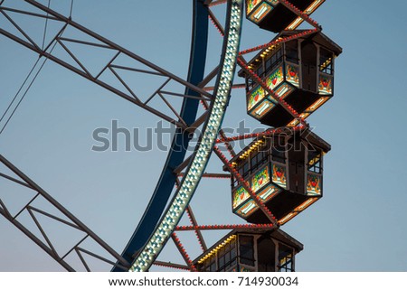 cabins of a big wheel in the evening light
