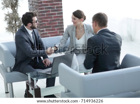 business handshake women with the client