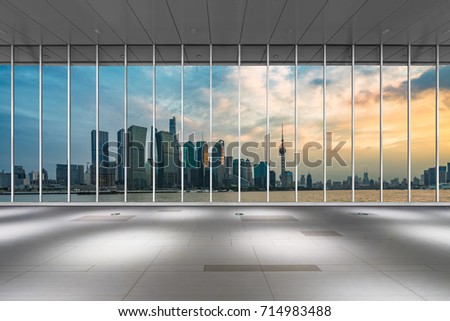 cityscape and skyline of shanghai from glass window
