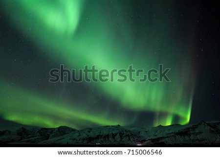 Amazing night wit Aurora borealis in Iceland  / Iceland