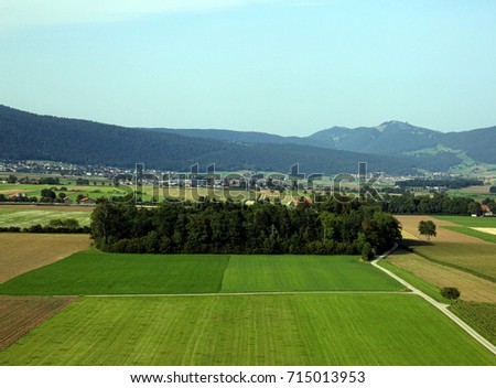 aerial view of forest and fields Royalty-Free Stock Photo #715013953