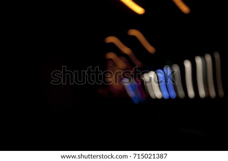 Sound wave concept from colorful bokeh light on dark background