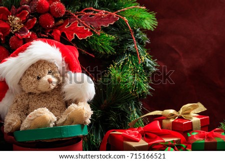 Christmas decoration, festive teddy bear and gifts