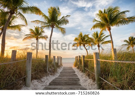 Footbridge to the Smathers beach on sunrise - Key West, Florida Royalty-Free Stock Photo #715260826