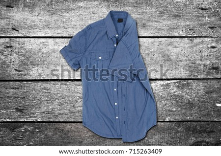  shirt on the wooden background