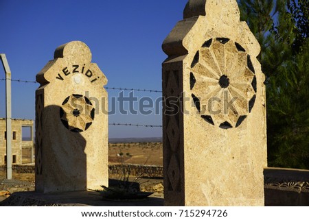  The sun  figured tombstones at ezidi (yazidi) cemetery, Midyat, Mardin, Turkey                               