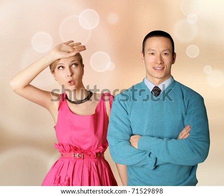 couple female in pink and male in blue