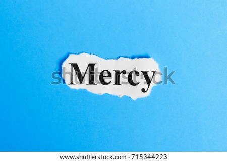 mercy text on paper. Word mercy on a piece of paper. Concept Image.