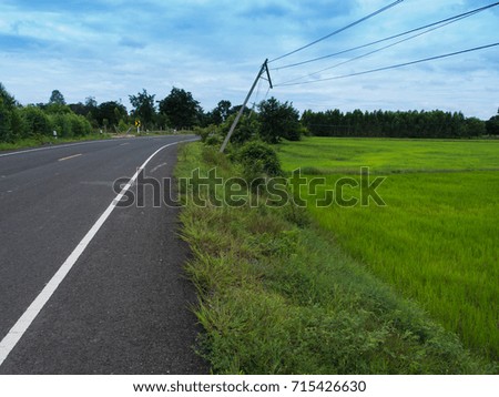 The Electric Tilting Parallel Poles along The Road