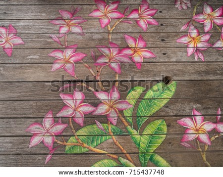 flower drawing on old wooden coffee table