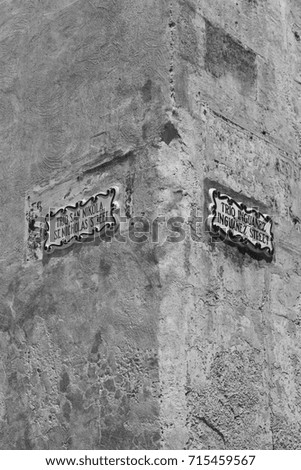 Street sign in the city of Mdina that was founded as Maleth in around the 8th century BC by Phoenician settlers on the island of Malta. Black and white picture