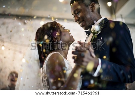 Newlywed African Descent Couple Dancing Wedding Celebration Royalty-Free Stock Photo #715461961