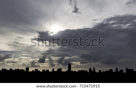 Twilight sky in evening with silhouette city. / Beautiful sky and silhouette city. / Abstract Background.