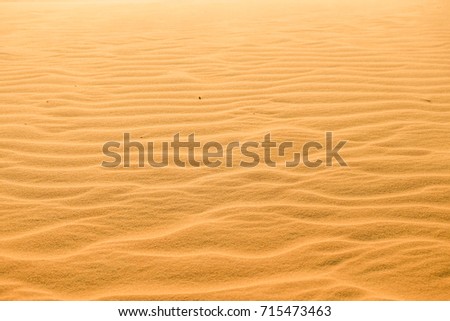 Red sand dunes landscape for background, Sandy attractions in Mui Ne, Vietnam. it is a spectacular place to be during sunset.