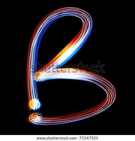 B - Created by light colorful letters over black background