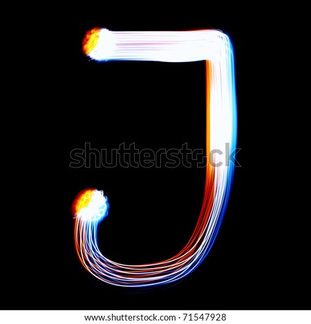 J - Created by light colorful letters over black background
