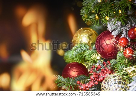 Beautiful decorated fireplace and Christmas tree 