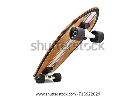 Black and wooden skate board isolated on a white background with clipping path