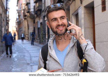 Portrait of a young man talking on the phone