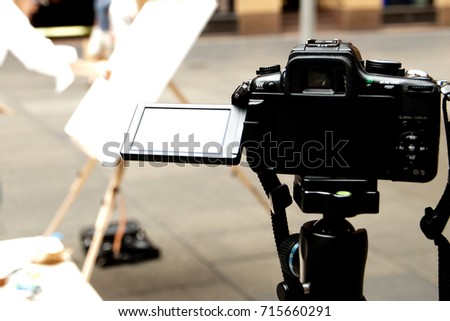 DSLR camera monitor when it flips up on the tripod.