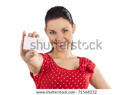 pretty smiling young woman in red dress with bussiness card against white background