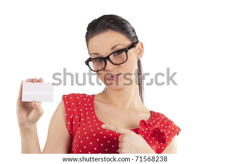 Portrait of young woman in red dress with bussiness card making funny face