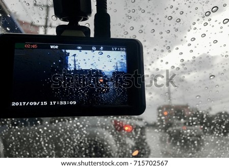 Defocussed camera in the car raining time.