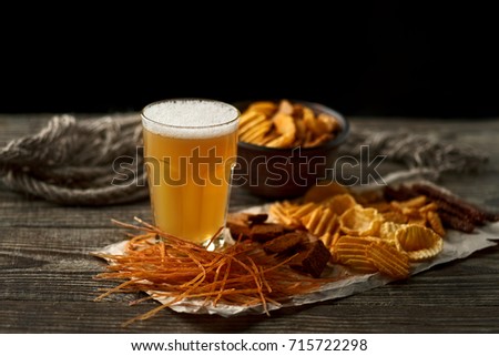 Beautiful advertising picture of beer on a dark background