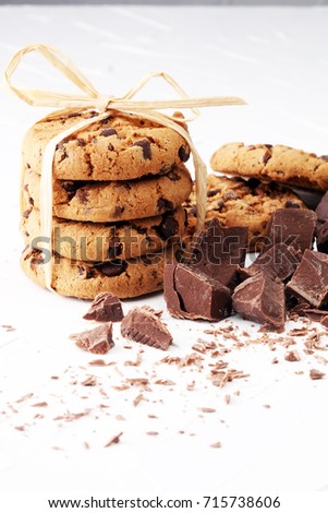 Chocolate cookies on white background with chocolate morsels