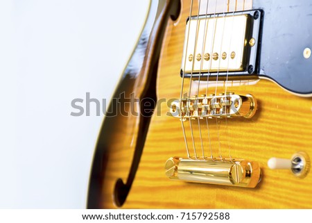 close up bridge guitar on white background