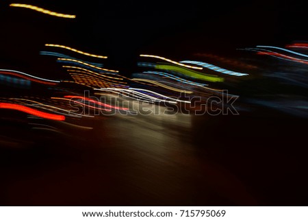 Abstract speed motion in urban highway road tunnel,blur driver view car drive on night road motion effect for background vintage color