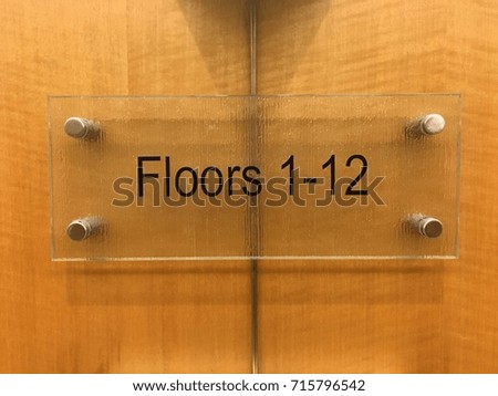 Floors 1-12 elevator sign 