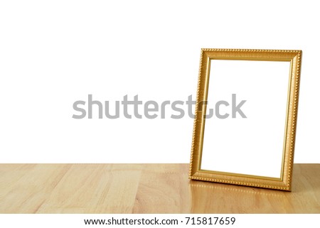Picture frame on wooden on white background with clipping path.