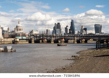 London City Skyline near Southwark Bridge over the River Thames