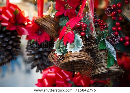 Christmas decorations on a Xmas market. Traditional holiday home decor for Christmas tree holiday season or gifts to family